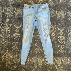 Blue ripped skinny jeans